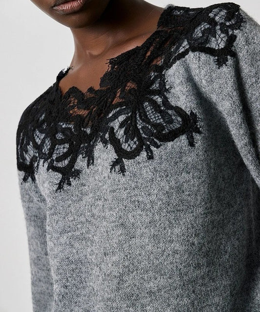 Jersey encaje negro.