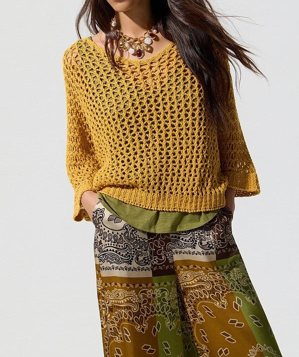 Jersey de punto amarillo.