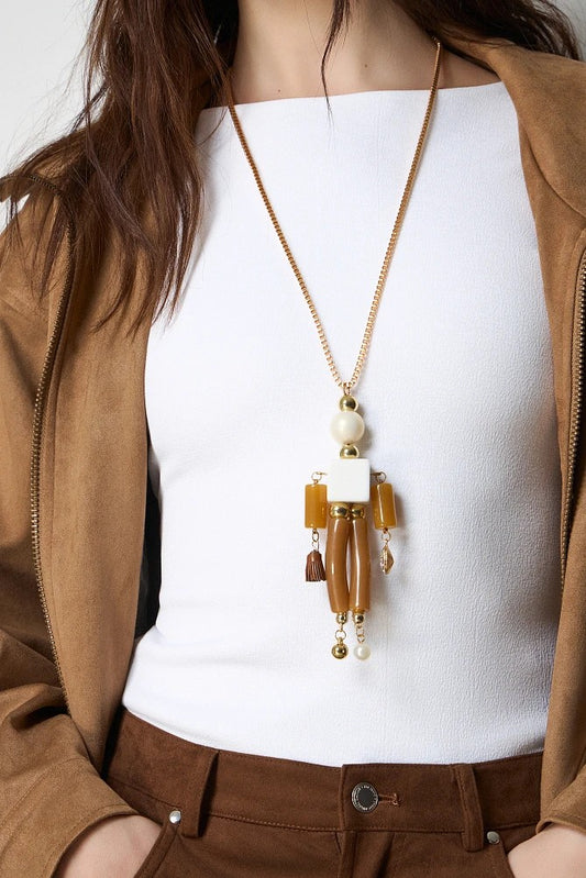 Collar muñeco.