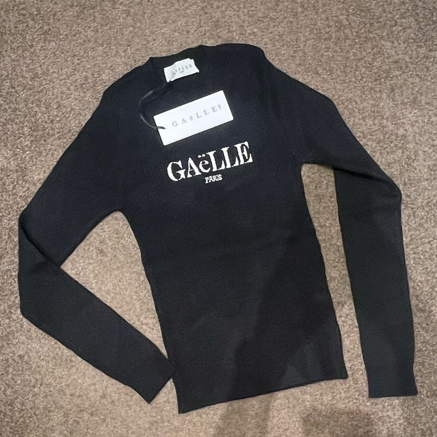 Top largo de manga larga negro