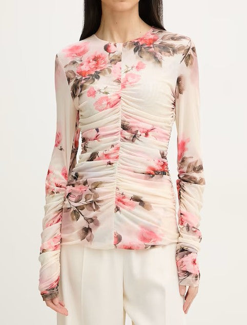 Blusa floral manga larga.