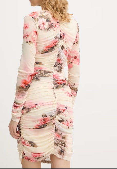 Vestido corto manga larga.