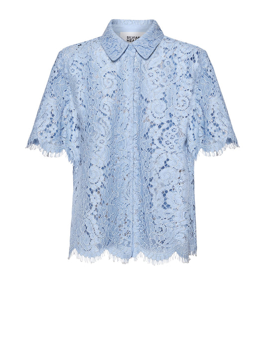Camisa manga corta encaje.