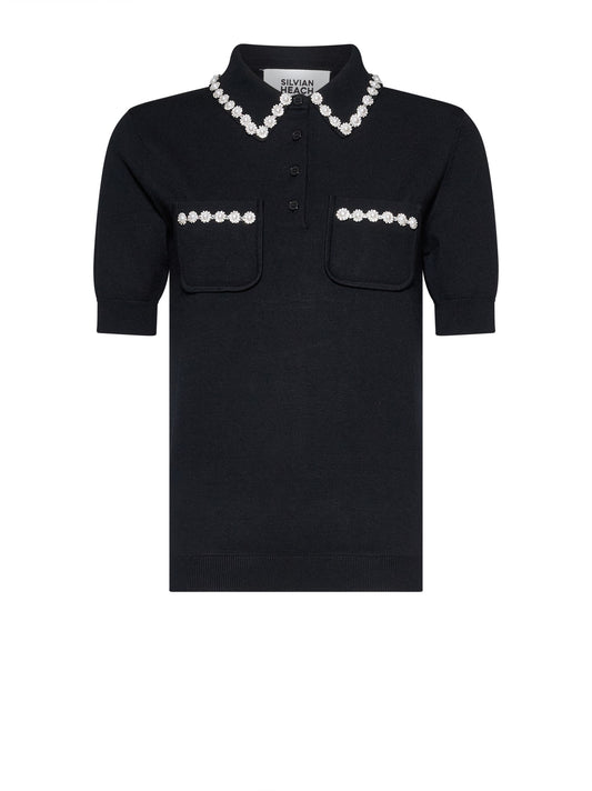 Polo manga corta negro.