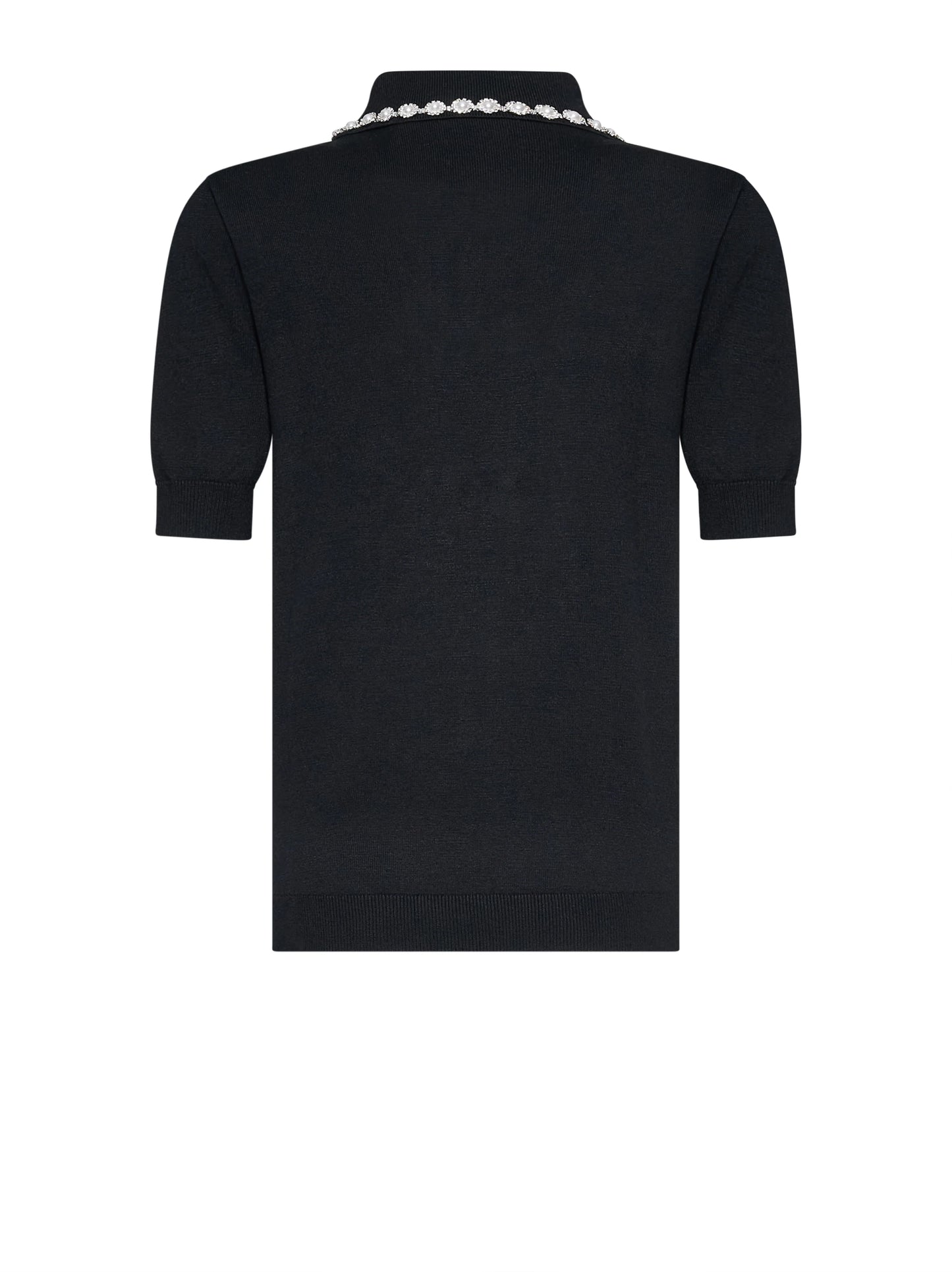 Polo manga corta negro.