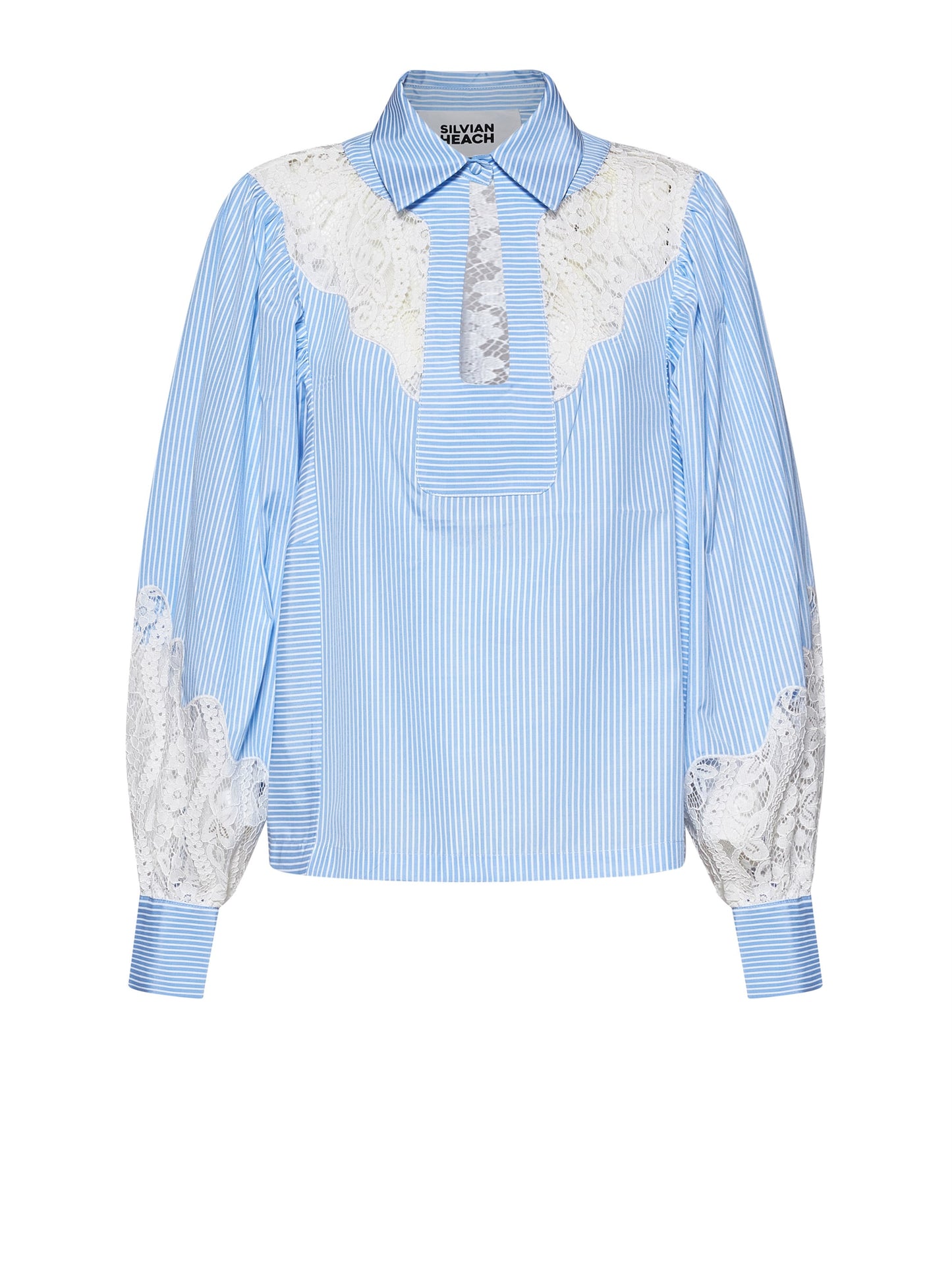 Camisa manga larga azul encaje.
