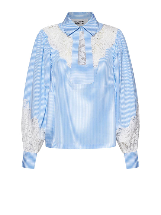Camisa manga larga azul encaje.