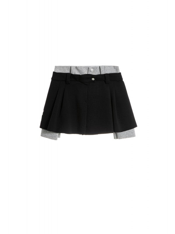 Falda/ pantalón negro y gris.