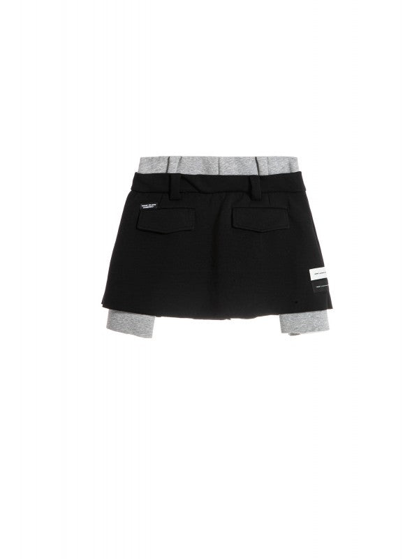 Falda/ pantalón negro y gris.