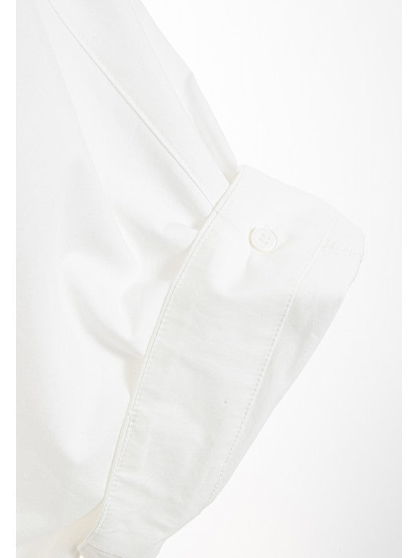 Camisa blanca manga corta.