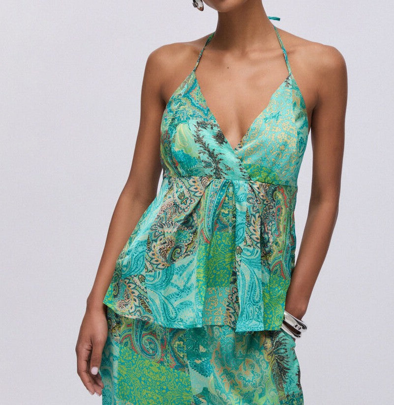 Top estampado verdes.