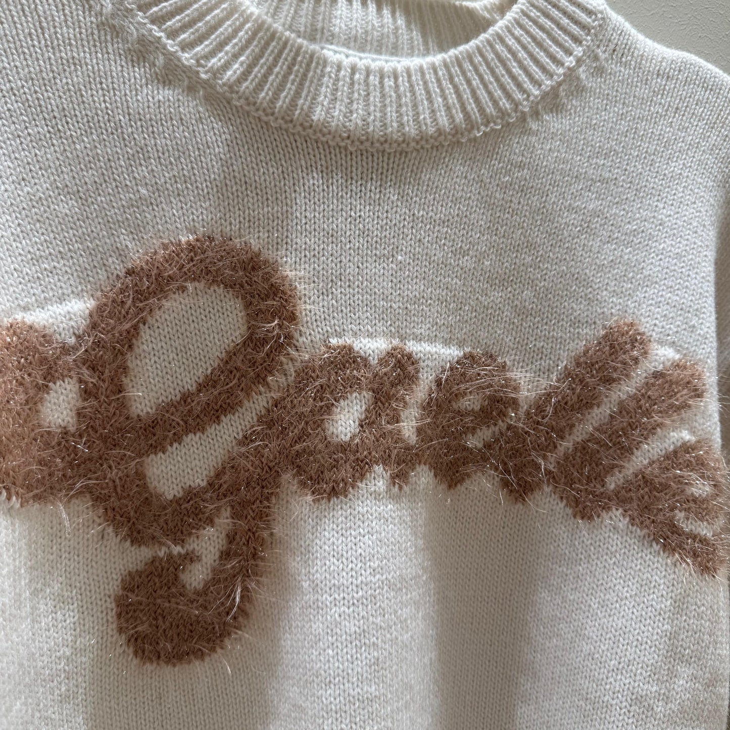 Jersey de lana en color crema