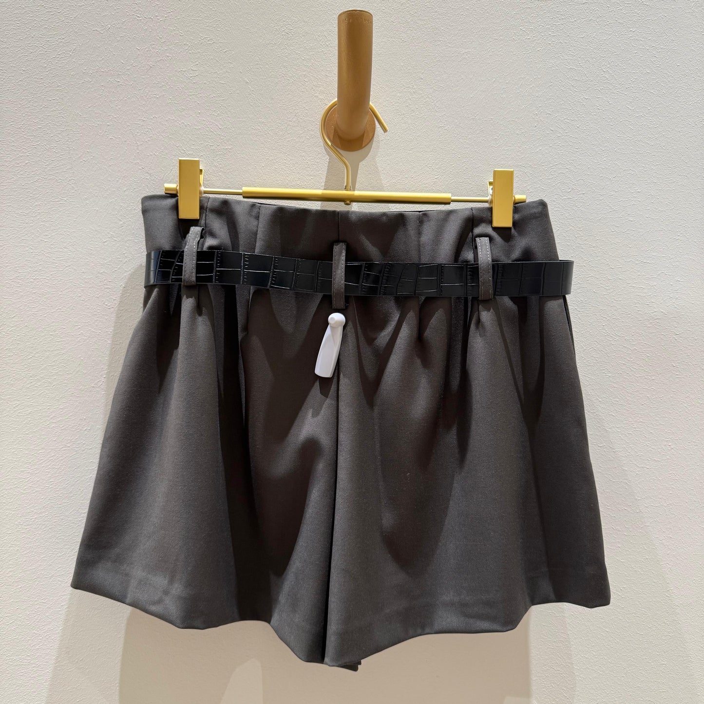 Pantalón corto verde con cinturón