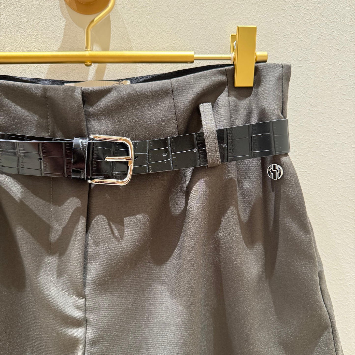 Pantalón corto verde con cinturón